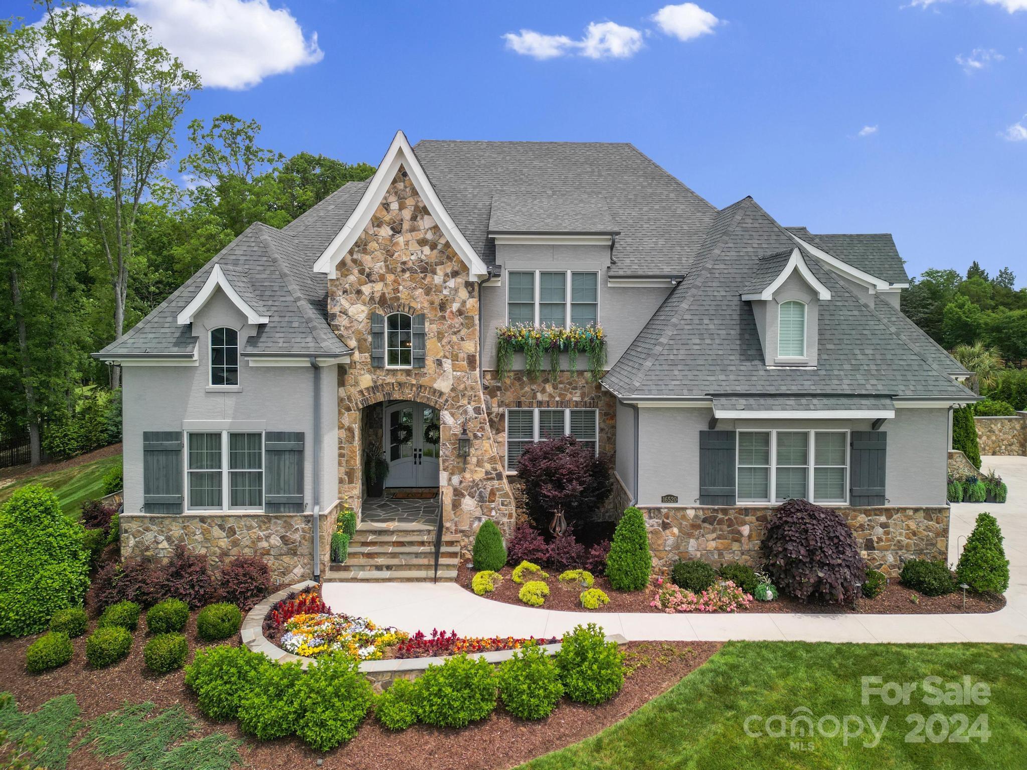 16520 Reinsch Drive Davidson, NC 28036 - Photo 36 of 37 front view of a house with a yard