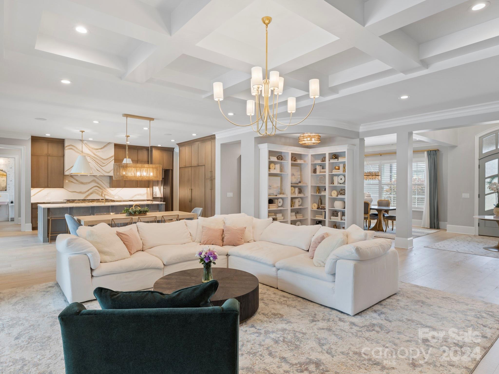 16520 Reinsch Drive Davidson, NC 28036 - Photo 10 of 37 a living room with furniture or chandelier and a dining table
