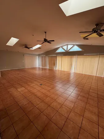 a view of an empty room and window