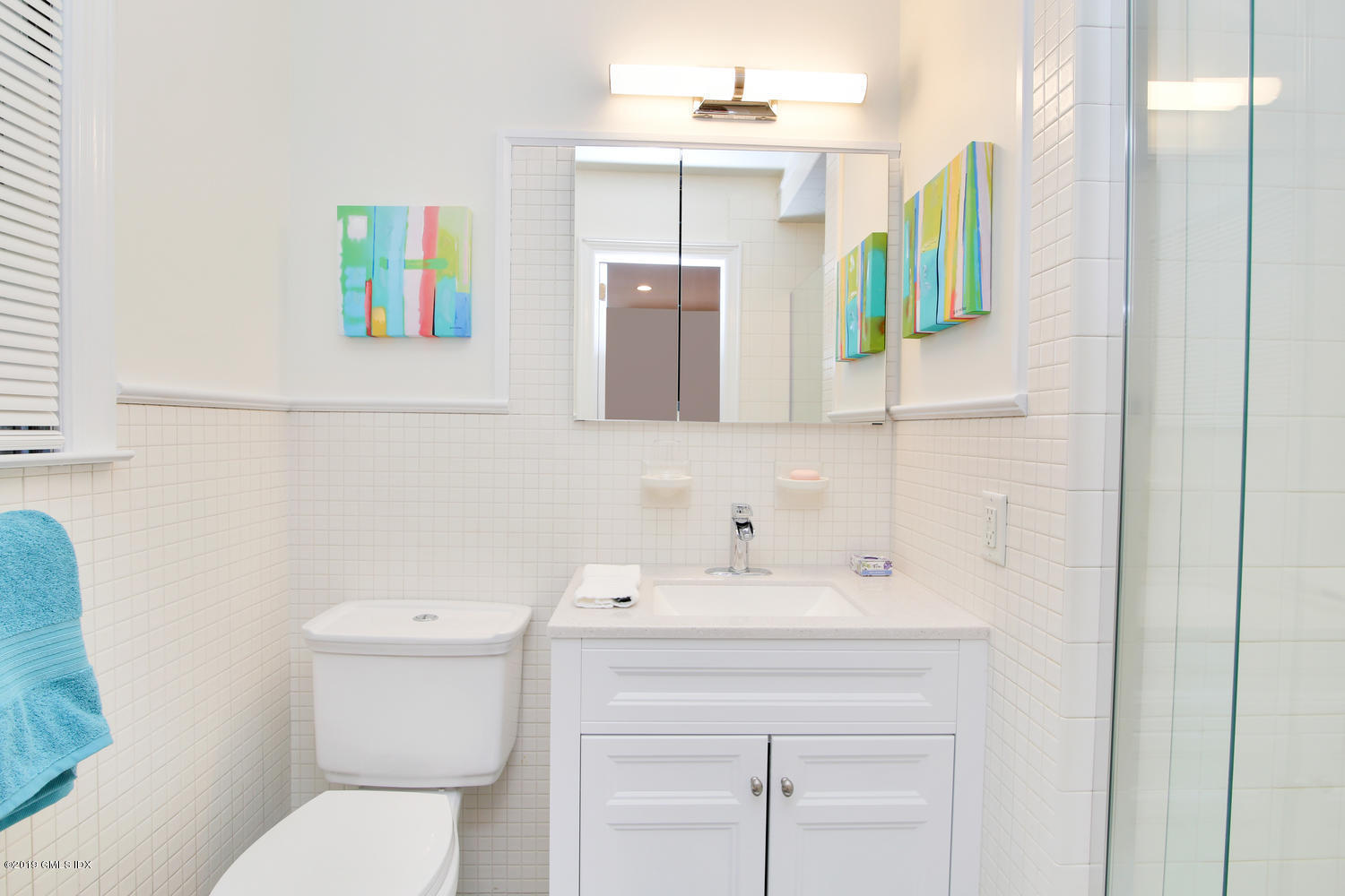 8 Marks Road Riverside, CT 06878 - Photo 20 of 24 a bathroom with a sink a toilet and mirror