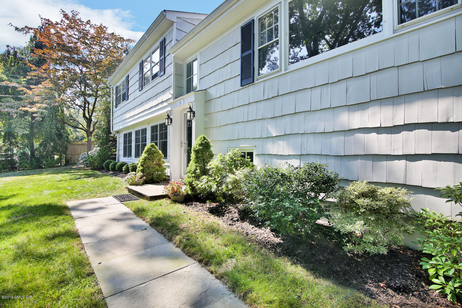 8 Marks Road Riverside, CT 06878 - Photo 3 of 24 a view of a house with a yard and plants