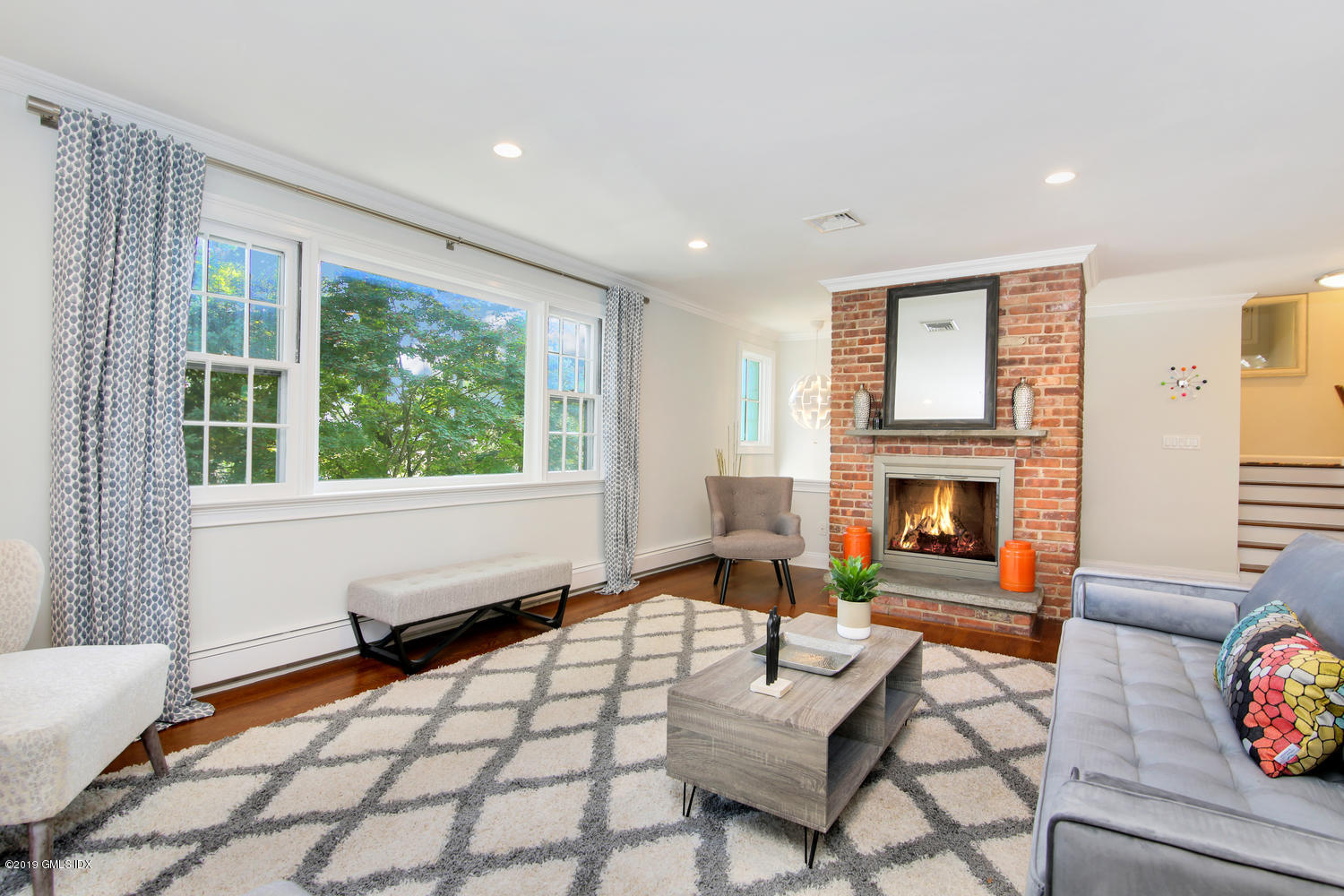 8 Marks Road Riverside, CT 06878 - Photo 6 of 24 a living room with furniture and a fireplace