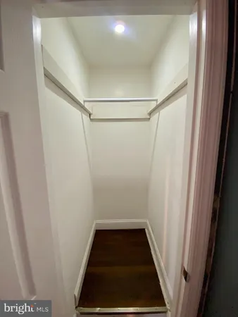 a bathroom with a bathtub shower sink and toilet