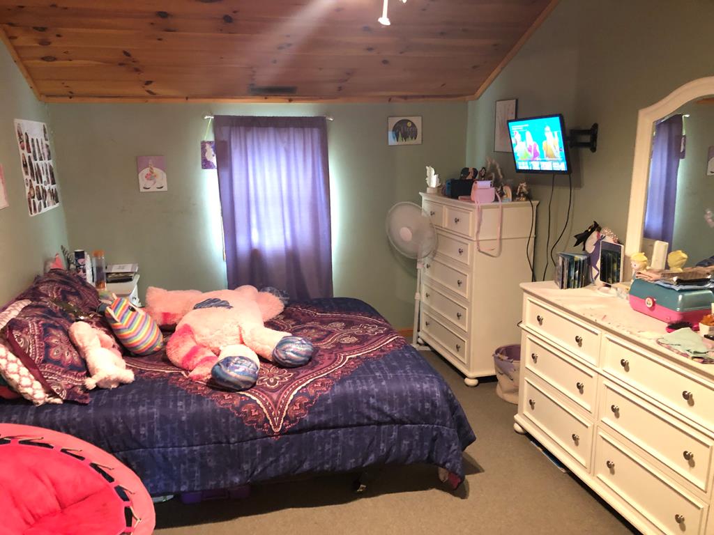 4659 Forest Road Cooksburg, PA 16217 - Photo 11 of 20 a bedroom with a bed and a dresser