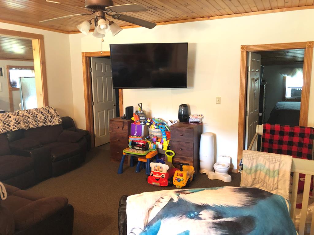 4659 Forest Road Cooksburg, PA 16217 - Photo 12 of 20 a living room with furniture and a flat screen tv