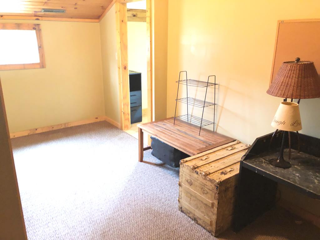 4659 Forest Road Cooksburg, PA 16217 - Photo 18 of 20 a living room with a table chairs and a table