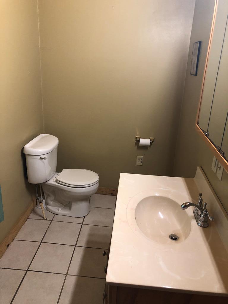 4659 Forest Road Cooksburg, PA 16217 - Photo 20 of 20 a bathroom with a sink and a toilet