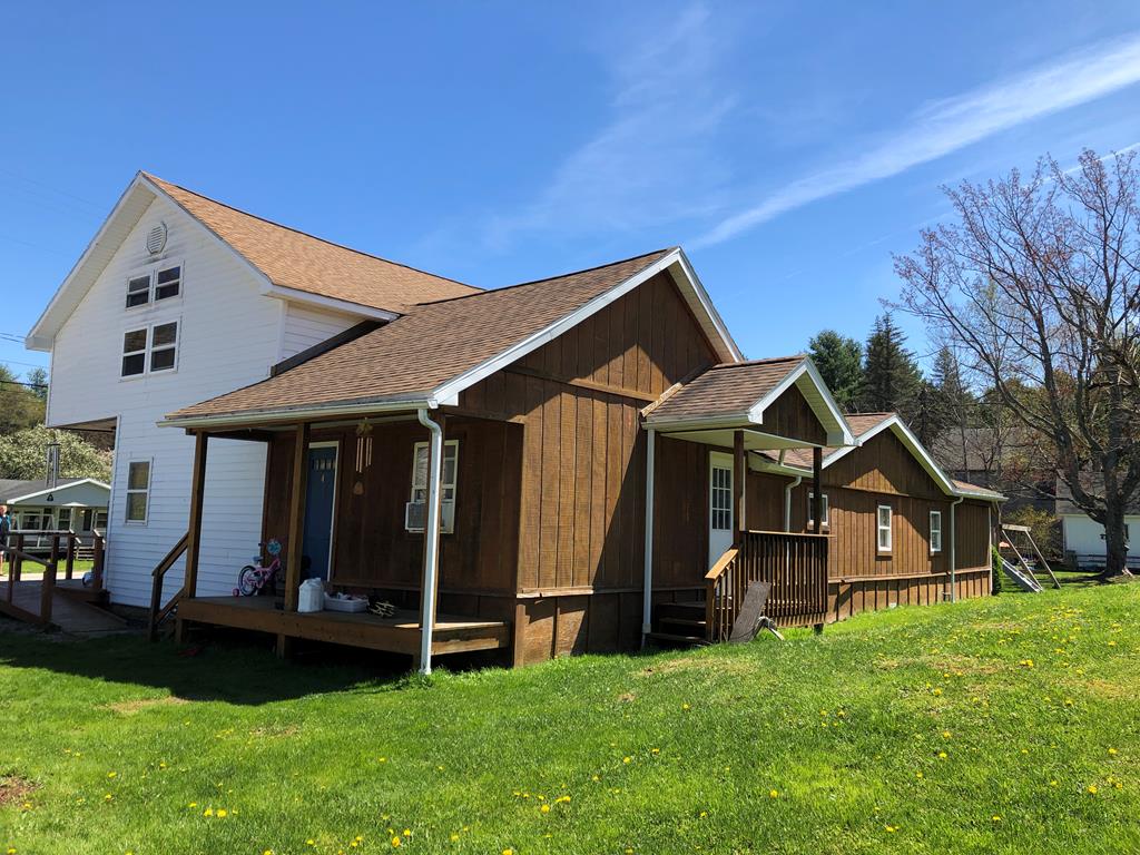 4659 Forest Road Cooksburg, PA 16217 - Photo 2 of 20 a front view of a house with a yard