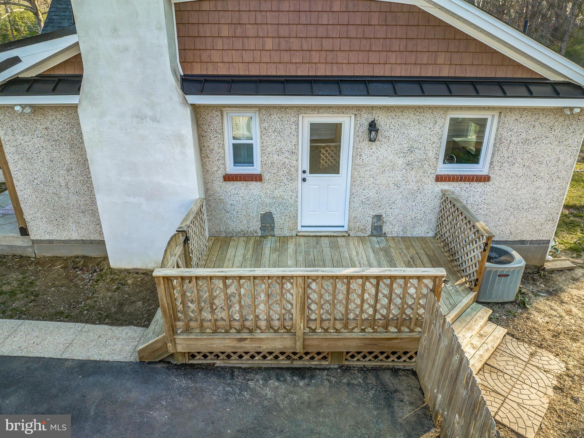 7450 Bensville Road Waldorf, MD 20603 - Photo 11 of 69 Deck on side of home w/ gate leads to back yard.