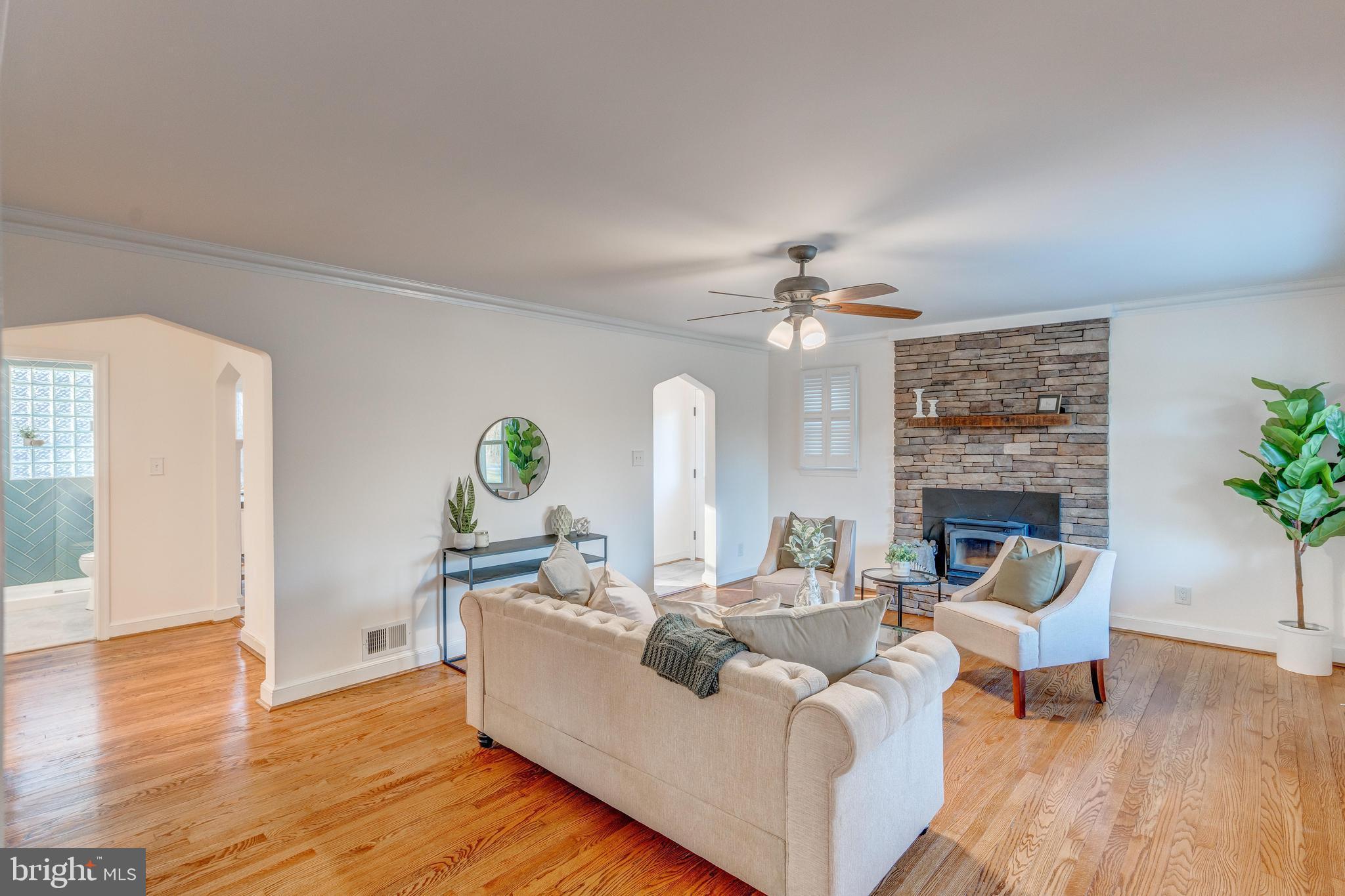 7450 Bensville Road Waldorf, MD 20603 - Photo 41 of 69 Livingrm, Stone fireplace/mental woodburn insert