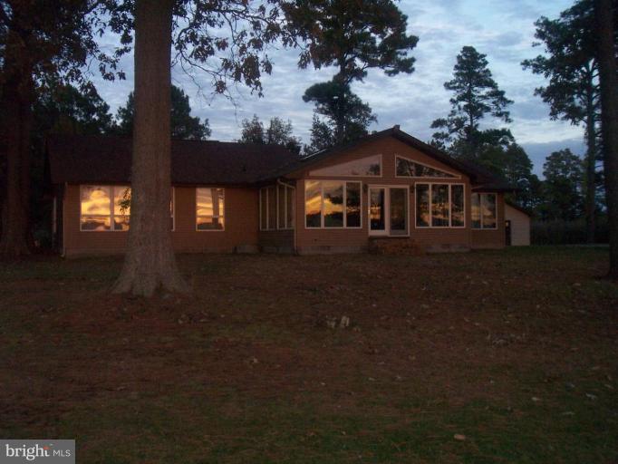 4641 Maple Dam Road Cambridge, MD 21613 - Photo 21 of 30 Sunset reflected on house from water.