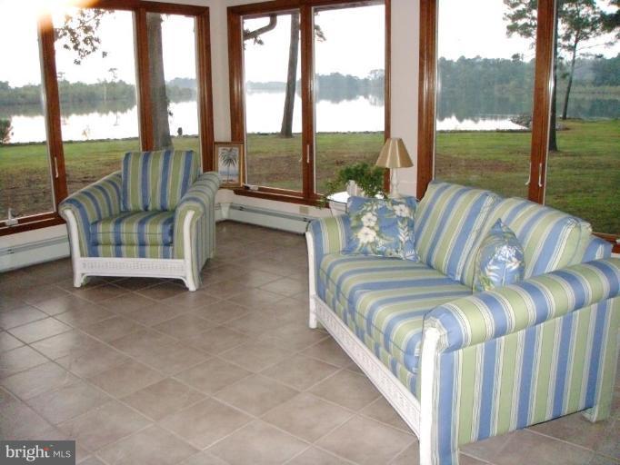 4641 Maple Dam Road Cambridge, MD 21613 - Photo 22 of 30 Sunporch on river side of house.