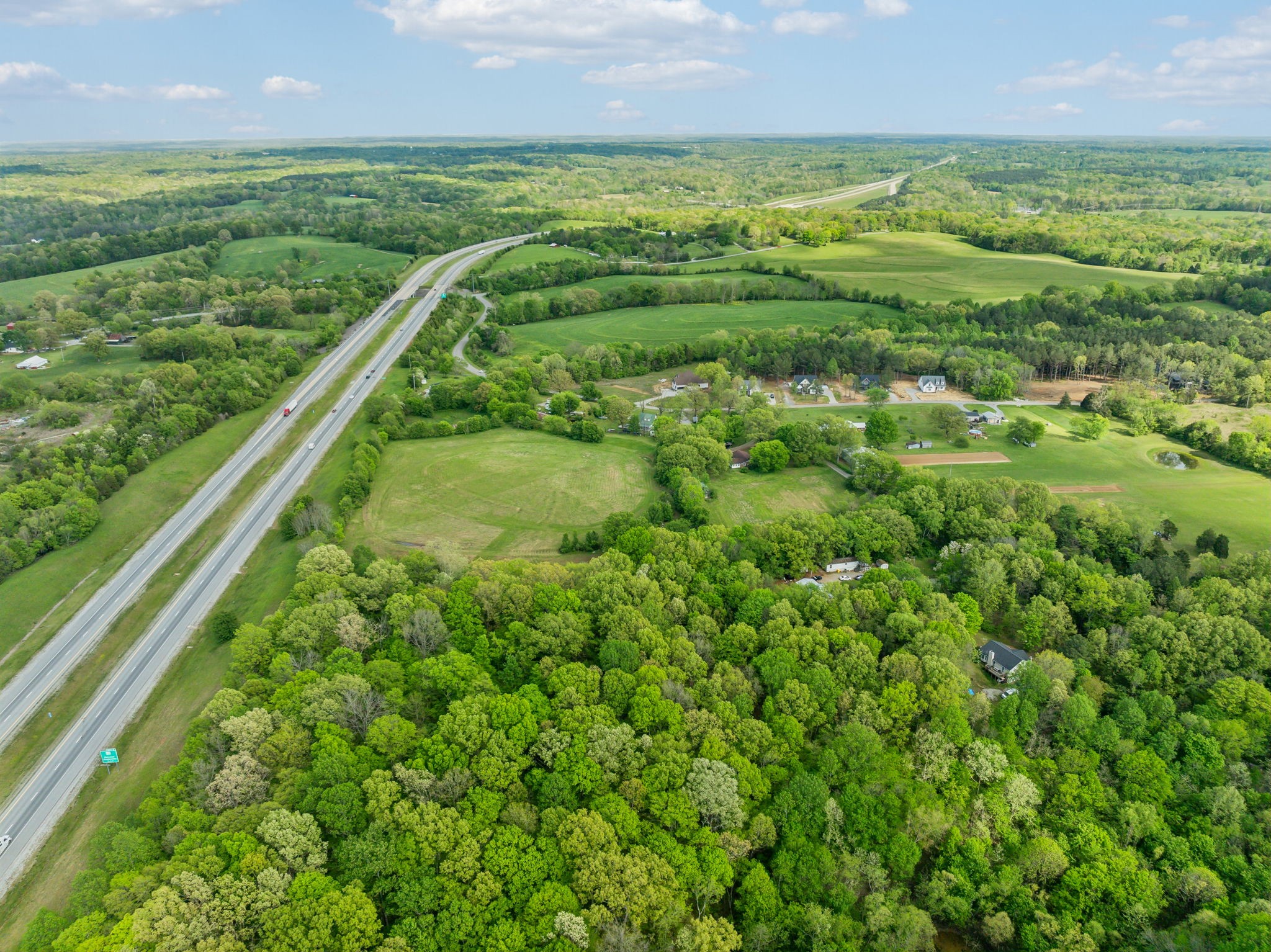 10924 Rials Branch Road Bon Aqua, TN 37025 - Photo 25 of 34 a view of a green field with lots of green space