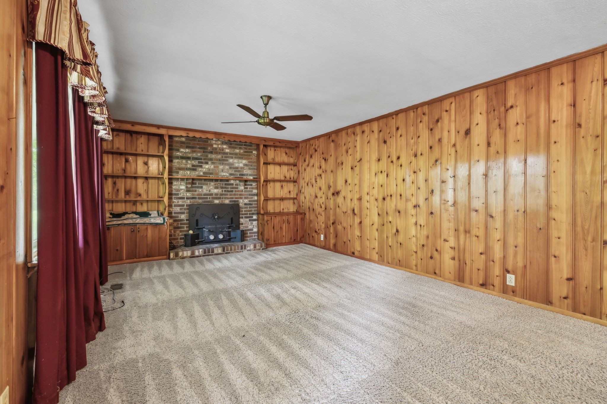 10924 Rials Branch Road Bon Aqua, TN 37025 - Photo 8 of 34 a view of a livingroom with furniture and hardwood floor