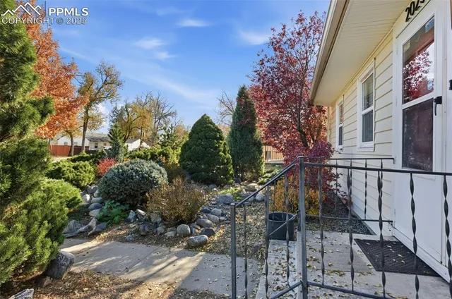 a view of entryway with wooden stairs