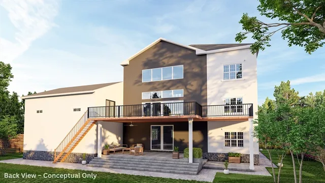 a view of a brick building next to a yard