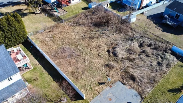 a view of swimming pool from a balcony