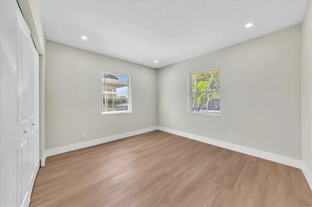 an empty room with windows