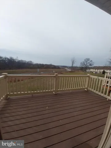 a view of wooden floor with a lake