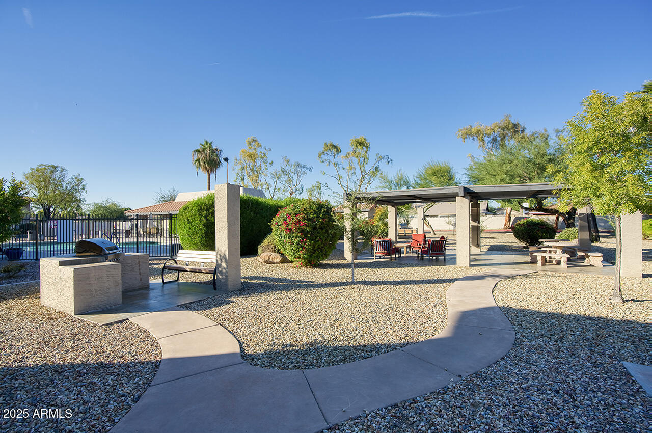 1402 East Guadalupe Road, Unit 149 Tempe, AZ 85283 - Photo 14 of 16 swimming pool view with a seating space