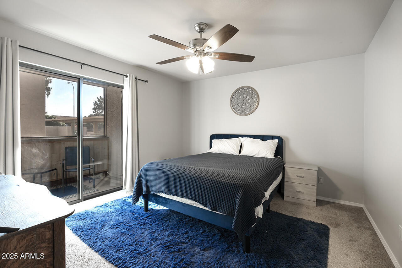1402 East Guadalupe Road, Unit 149 Tempe, AZ 85283 - Photo 7 of 16 a bedroom with a bed and window