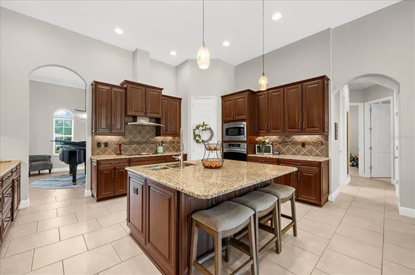 $840,000 | 8904 Crystal Creek Court, Land O Lakes, FL 34638