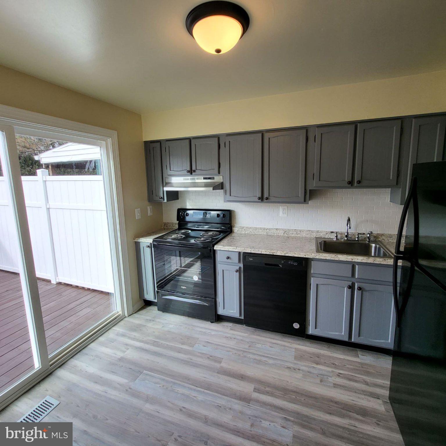 8 Perryfalls Place Nottingham, MD 21236 - Photo 6 of 23 Modern kitchen with natural light.