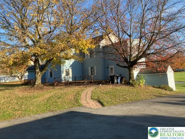 4131 Orefield Road Allentown, PA 18104 - Photo 5 of 20 a view of a house with snow on the side of it