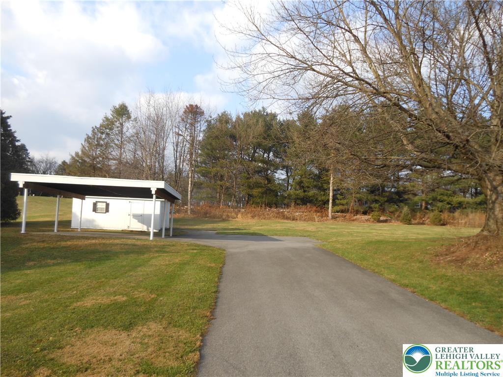 4131 Orefield Road Allentown, PA 18104 - Photo 6 of 20 a view of big yard with a house