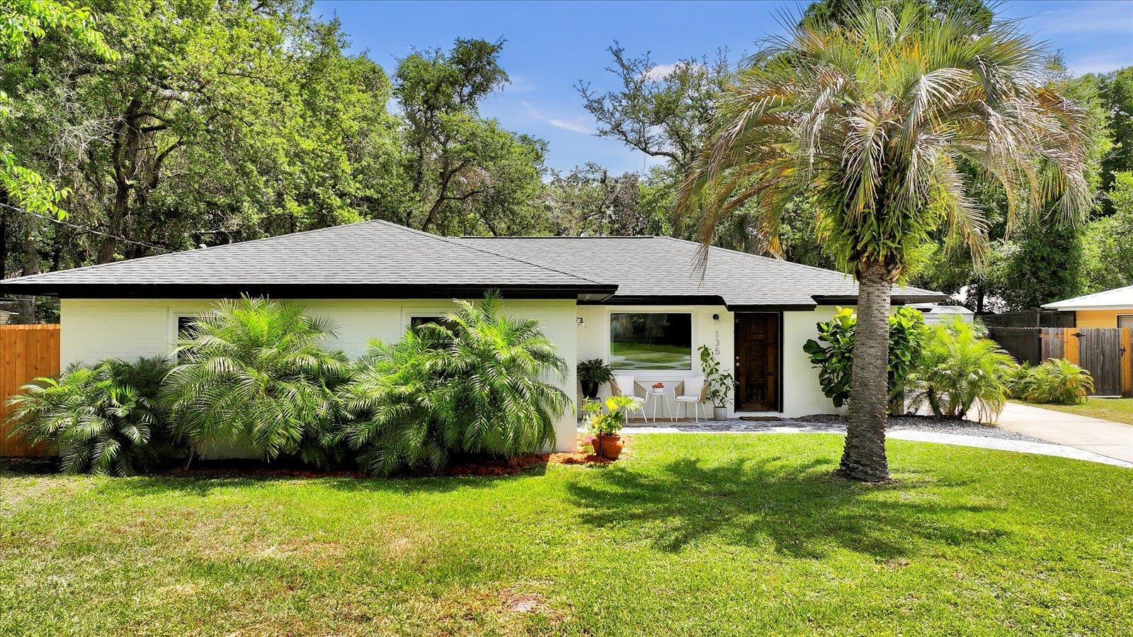 135 Orchis Road St. Augustine, FL 32086 - Photo 1 of 50 a view of a swimming pool with a patio