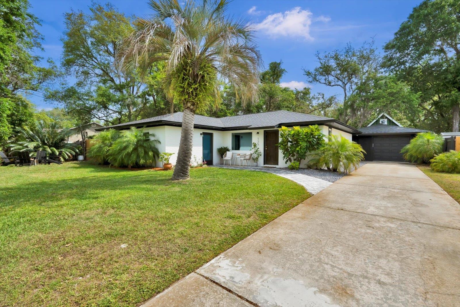 135 Orchis Road St. Augustine, FL 32086 - Photo 15 of 50 a view of house with yard and green space