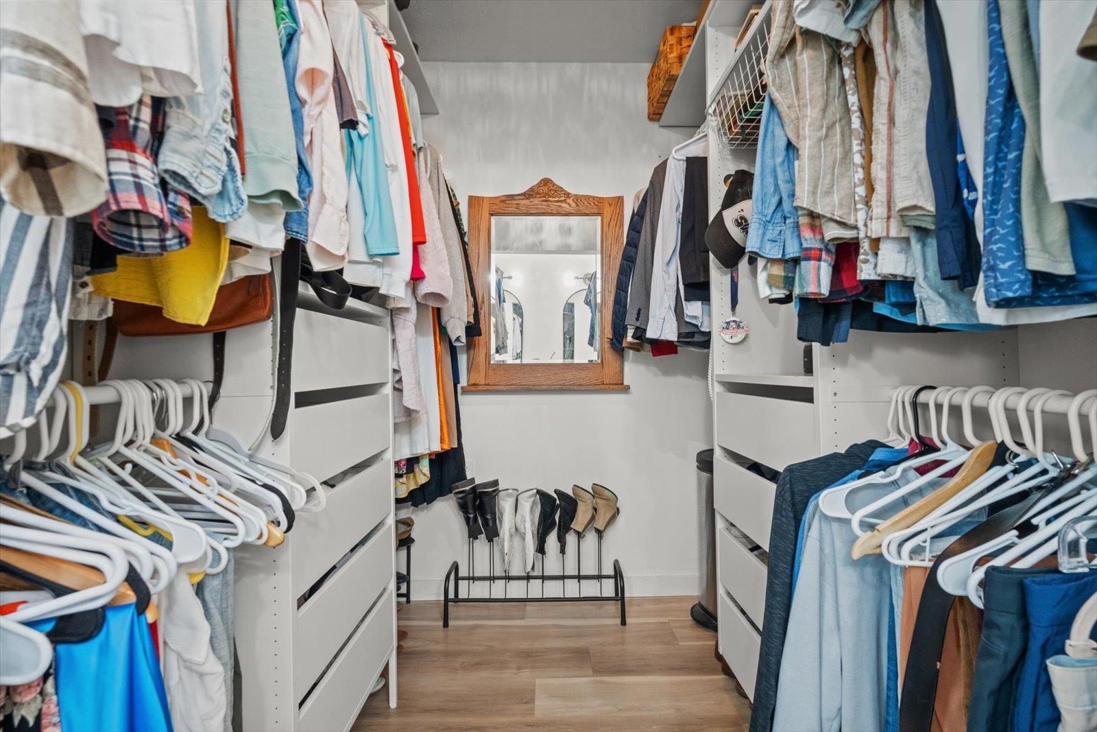 135 Orchis Road St. Augustine, FL 32086 - Photo 38 of 50 a view of walk in closet with clothes and shoes