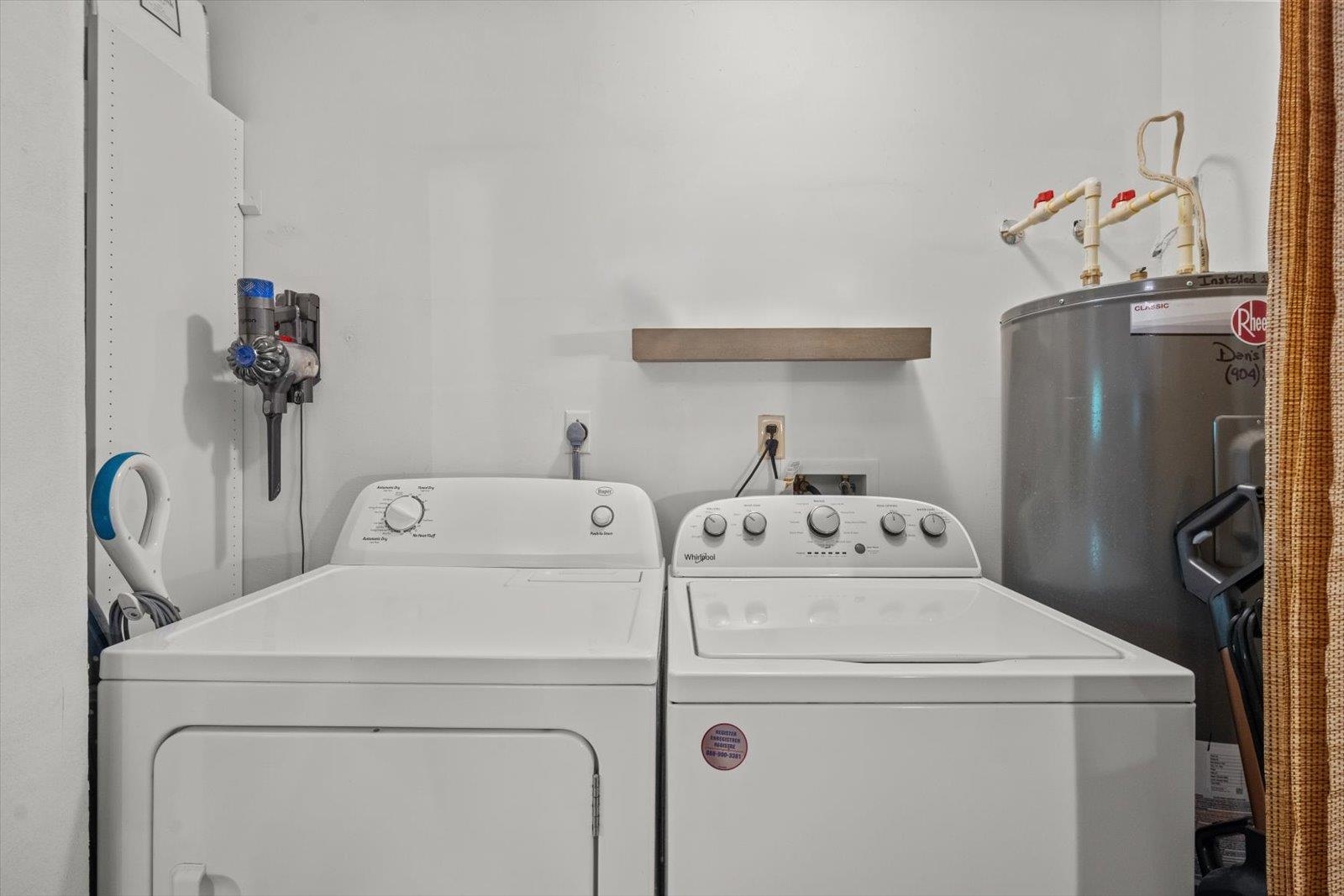 135 Orchis Road St. Augustine, FL 32086 - Photo 41 of 50 a utility room with dryer and washer