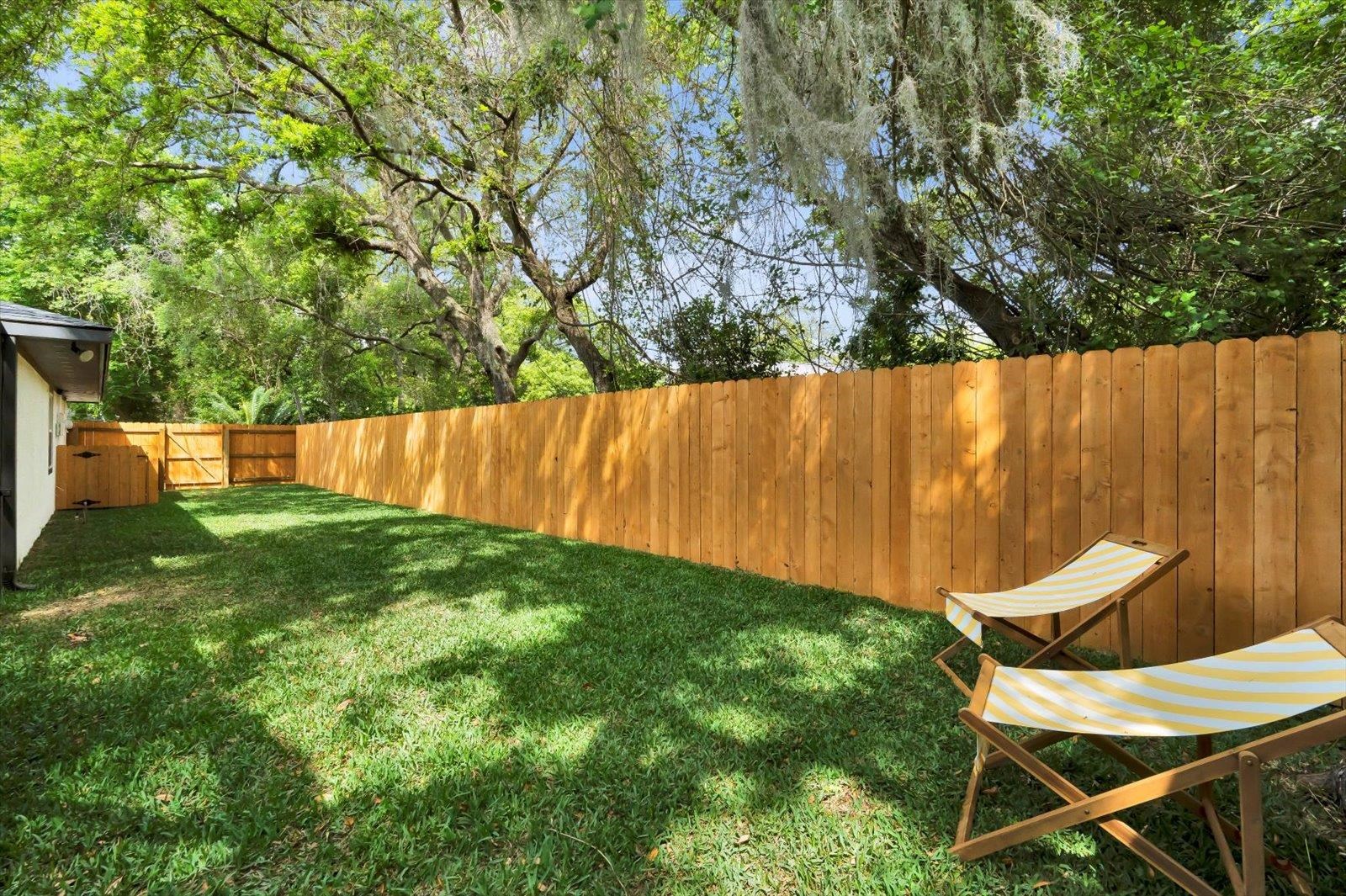 135 Orchis Road St. Augustine, FL 32086 - Photo 47 of 50 a view of yard with green space and wooden fence