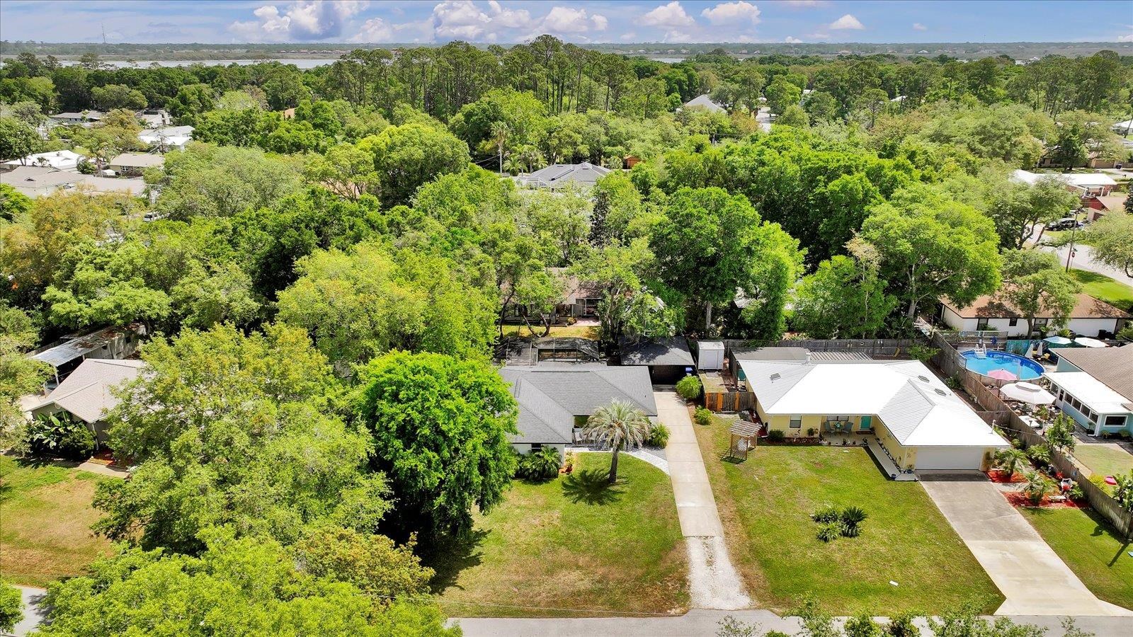 135 Orchis Road St. Augustine, FL 32086 - Photo 5 of 50 an aerial view of a swimming pool with outdoor space