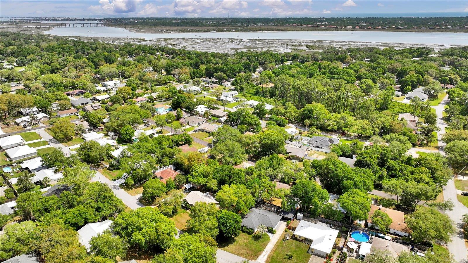 135 Orchis Road St. Augustine, FL 32086 - Photo 7 of 50 a view of a lake with a house