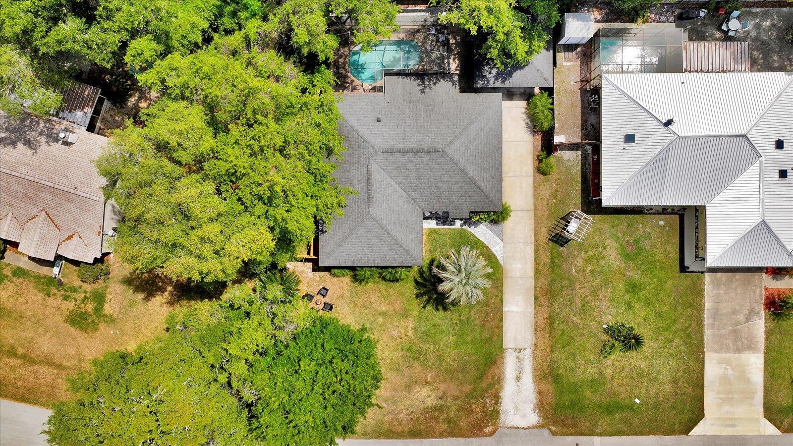 135 Orchis Road St. Augustine, FL 32086 - Photo 8 of 50 an aerial view of residential houses with outdoor space