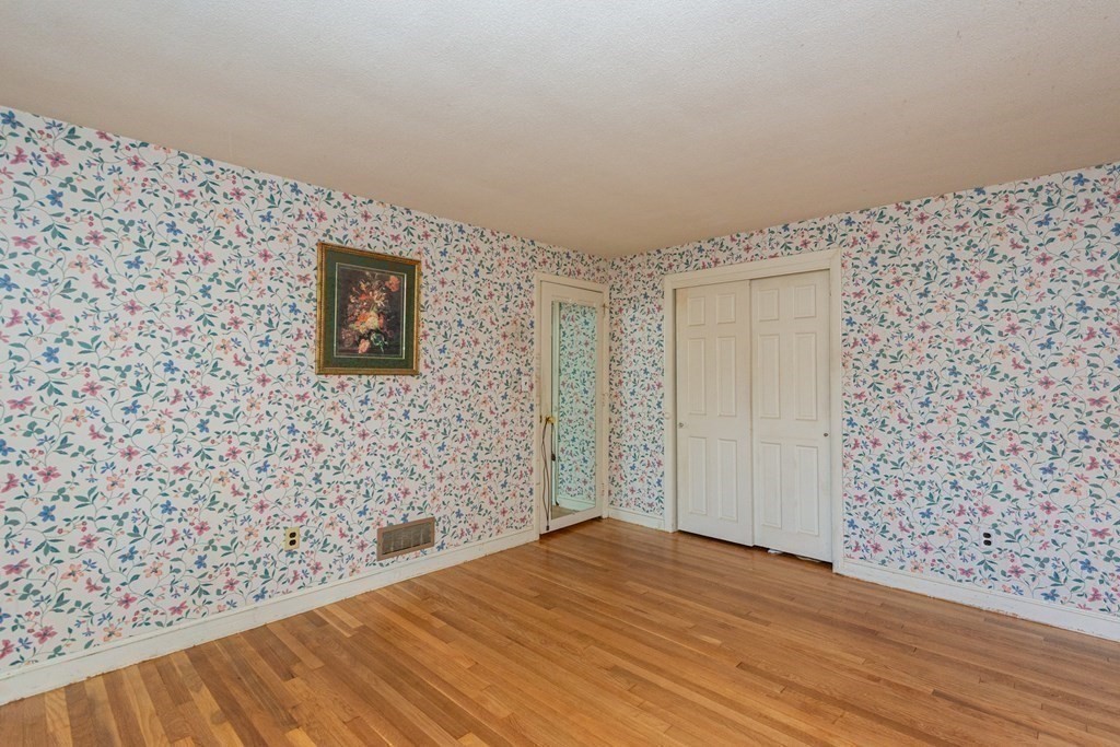 91 Brookside Road Lynn, MA 01902 - Photo 18 of 28 a view of empty room with wooden floor