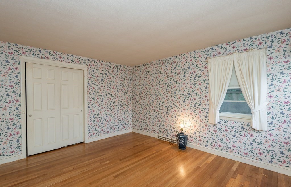 91 Brookside Road Lynn, MA 01902 - Photo 19 of 28 a view of empty room with wooden floor