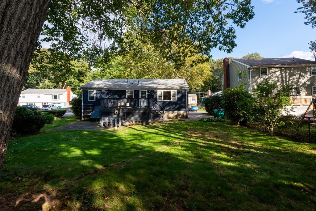 91 Brookside Road Lynn, MA 01902 - Photo 27 of 28 a view of a house with a yard porch and sitting area