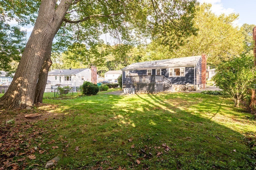 91 Brookside Road Lynn, MA 01902 - Photo 6 of 28 a view of a house with a yard