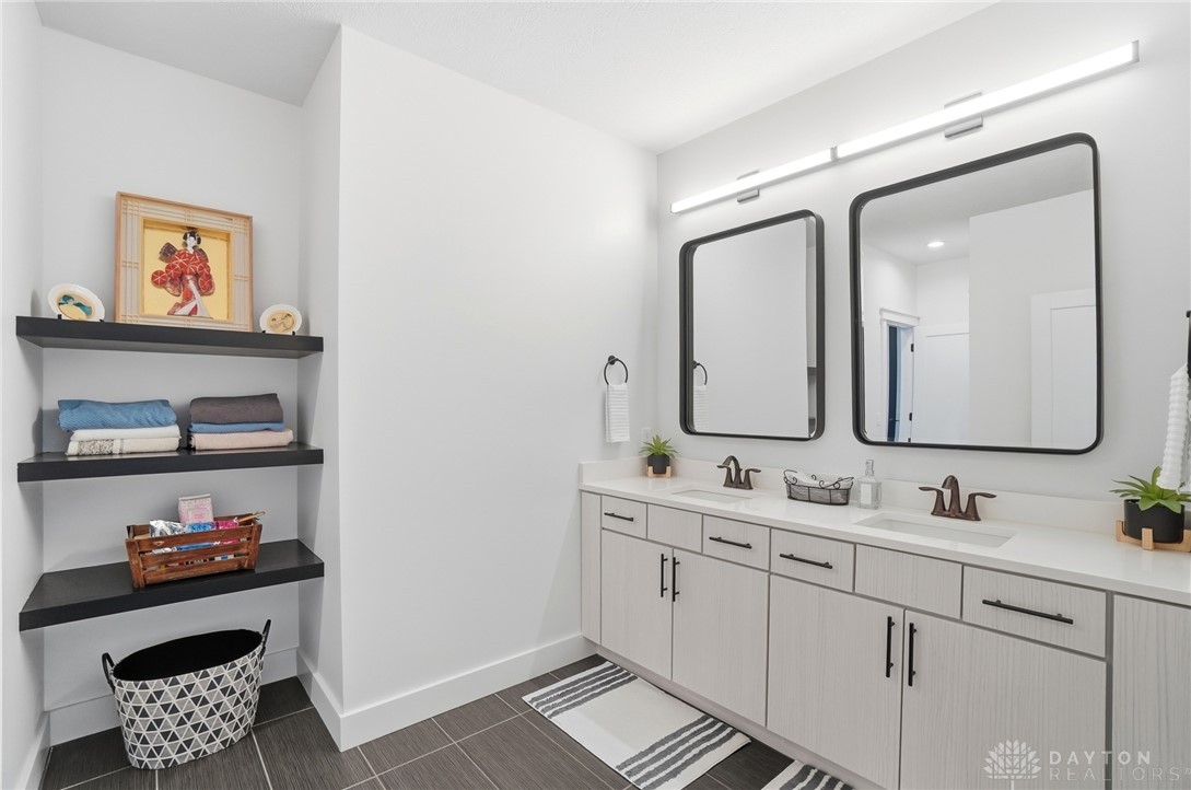 1247 Normandy Rue Dayton, OH 45458 - Photo 32 of 76 This modern bathroom features a dual vanity, providing both style and convenience.