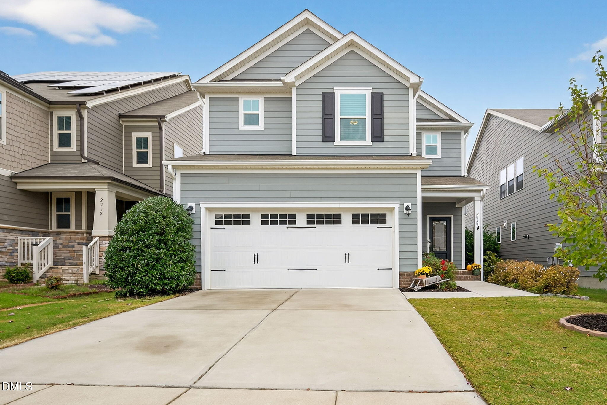 2928 Murray Rdg Trail Apex, NC 27502 - Photo 1 of 35 a front view of a house with a yard and garage