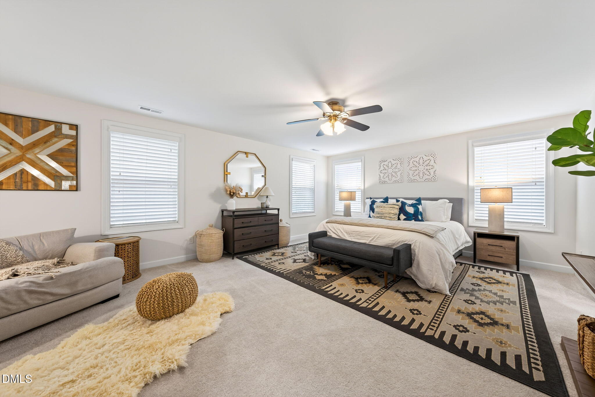 2928 Murray Rdg Trail Apex, NC 27502 - Photo 13 of 35 a bedroom with a bed large mirror and window