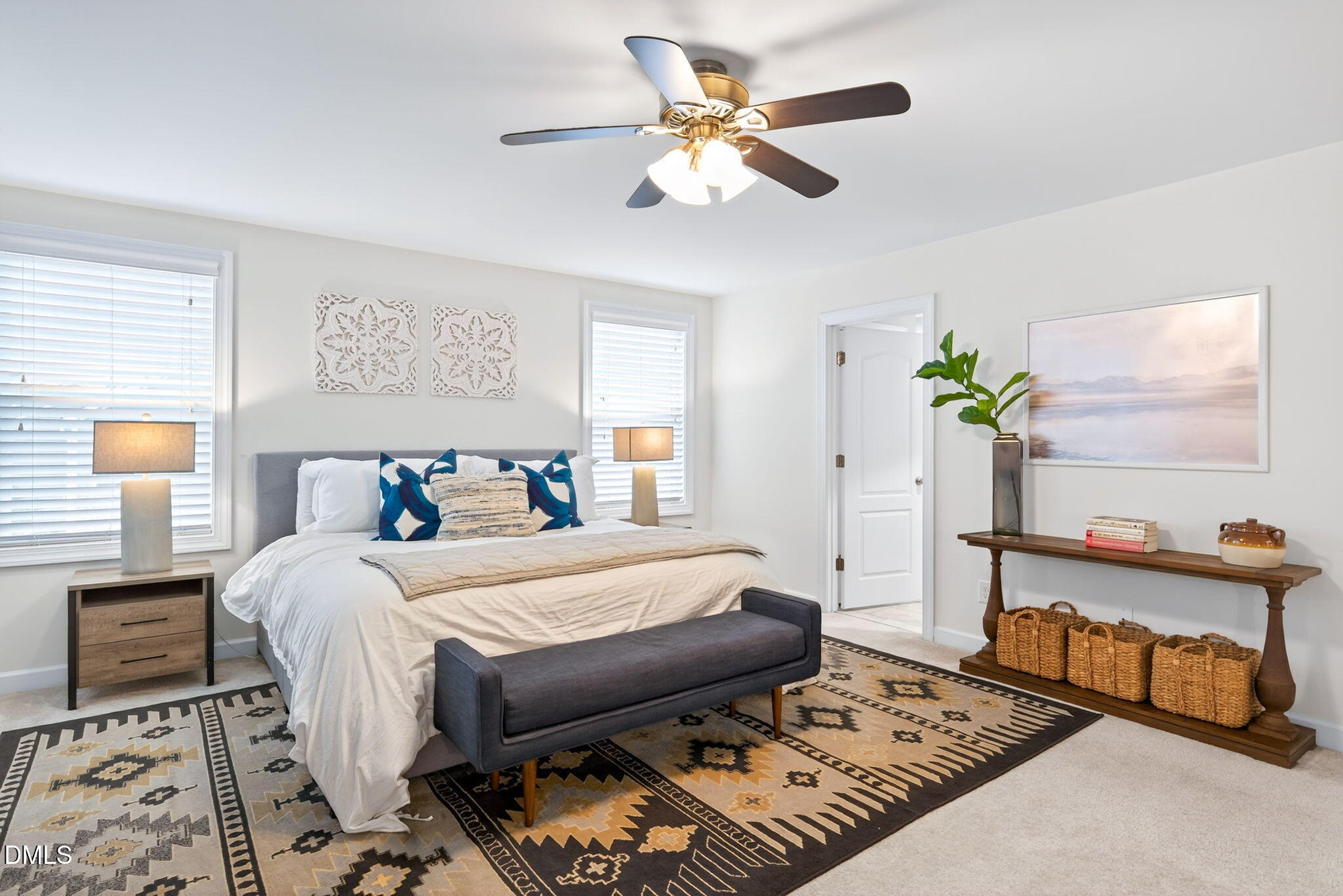 2928 Murray Rdg Trail Apex, NC 27502 - Photo 15 of 35 a bedroom with a bed and a chandelier