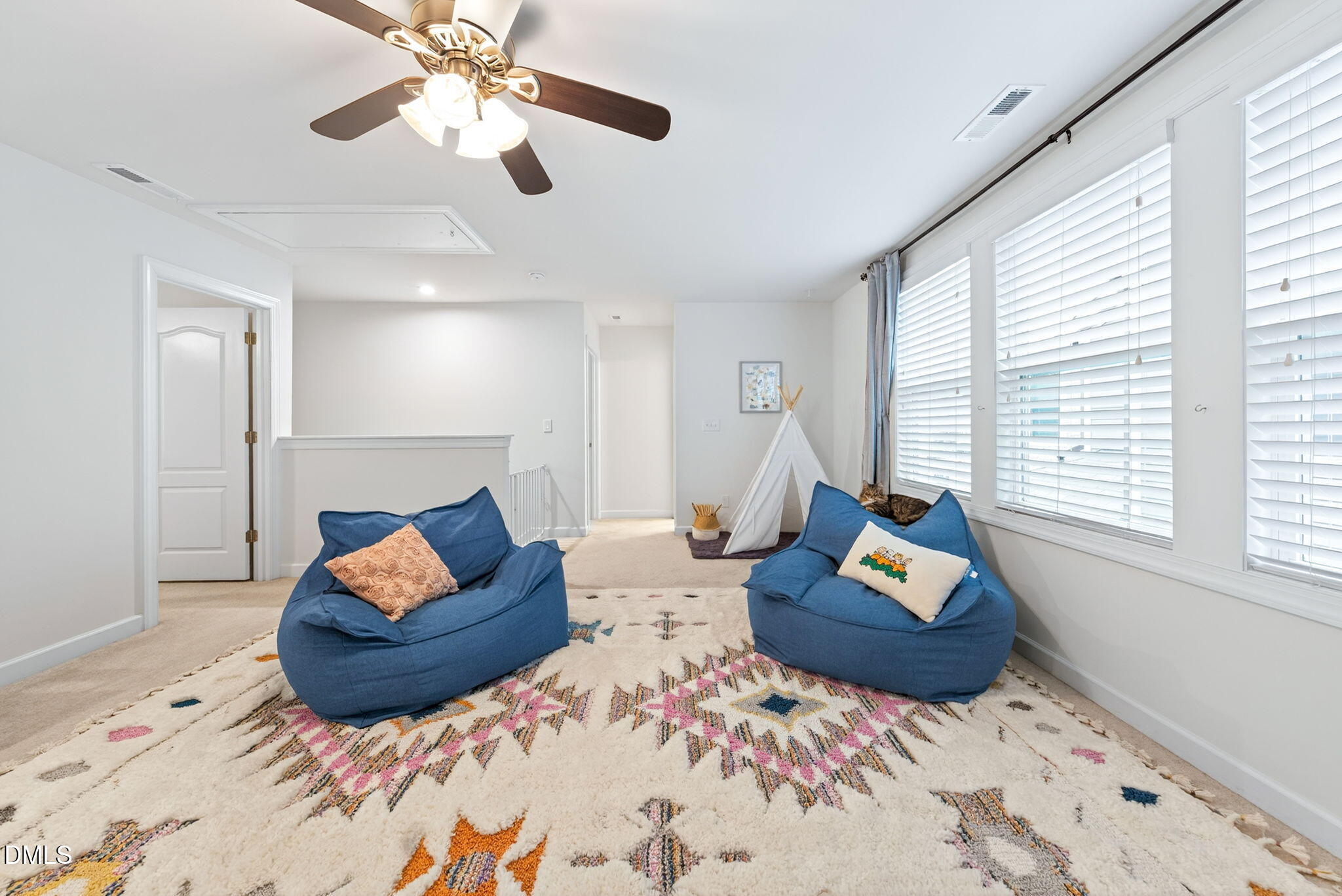 2928 Murray Rdg Trail Apex, NC 27502 - Photo 22 of 35 a living room with furniture and a large window