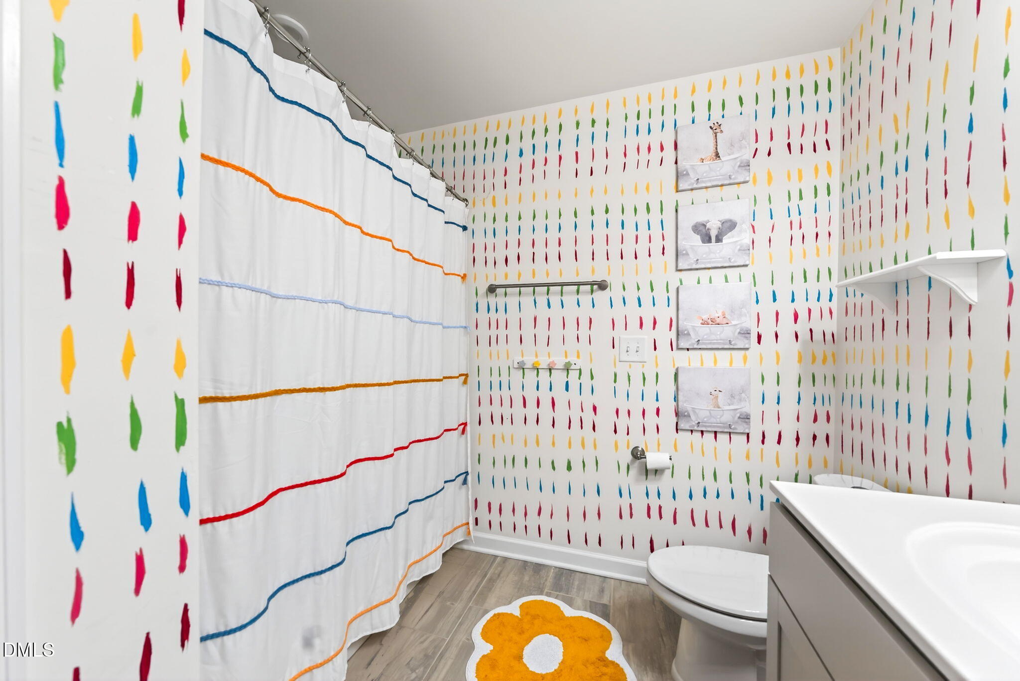 2928 Murray Rdg Trail Apex, NC 27502 - Photo 24 of 35 a bathroom with a sink toilet and shower