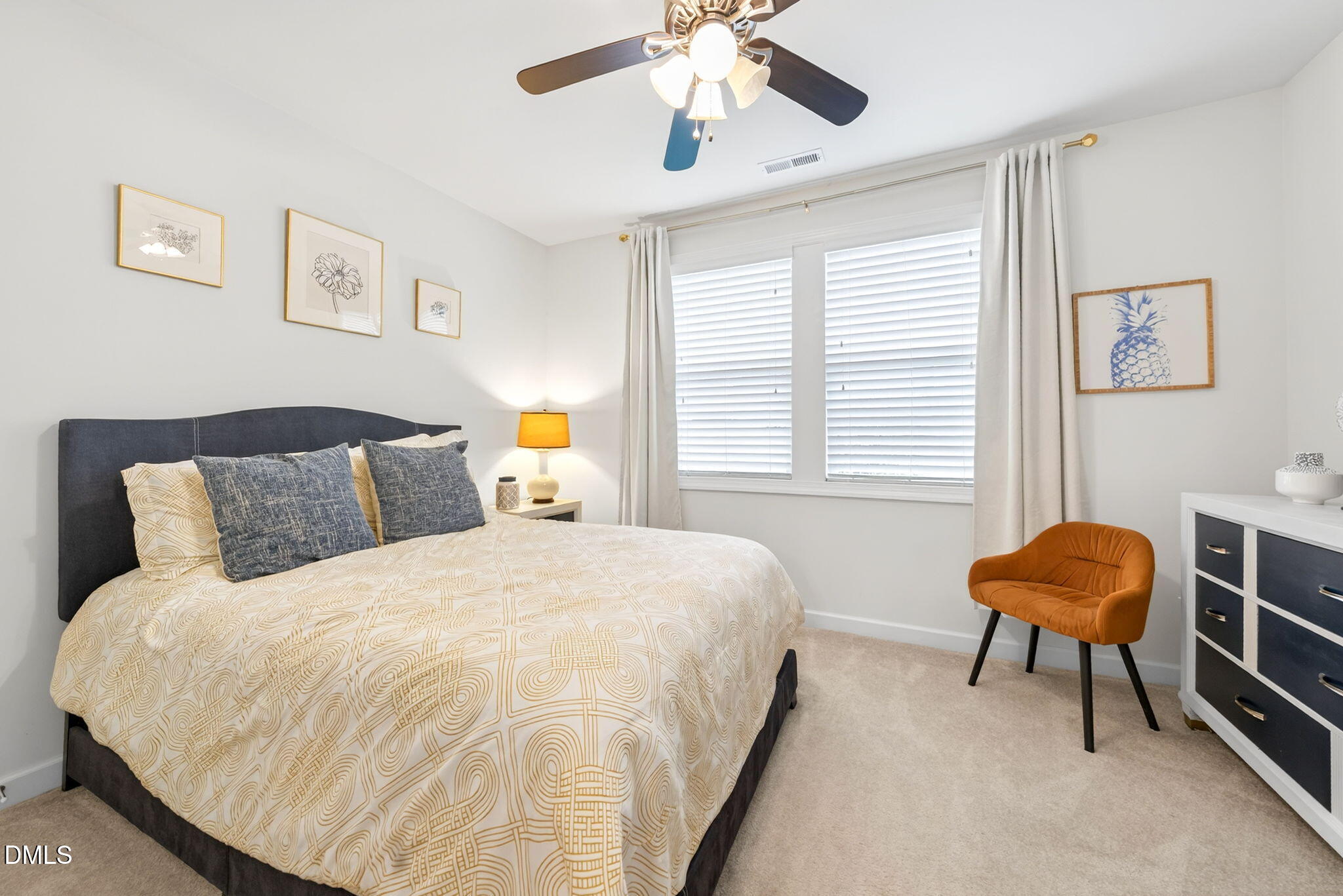 2928 Murray Rdg Trail Apex, NC 27502 - Photo 27 of 35 a bedroom with a bed a lamp and a window