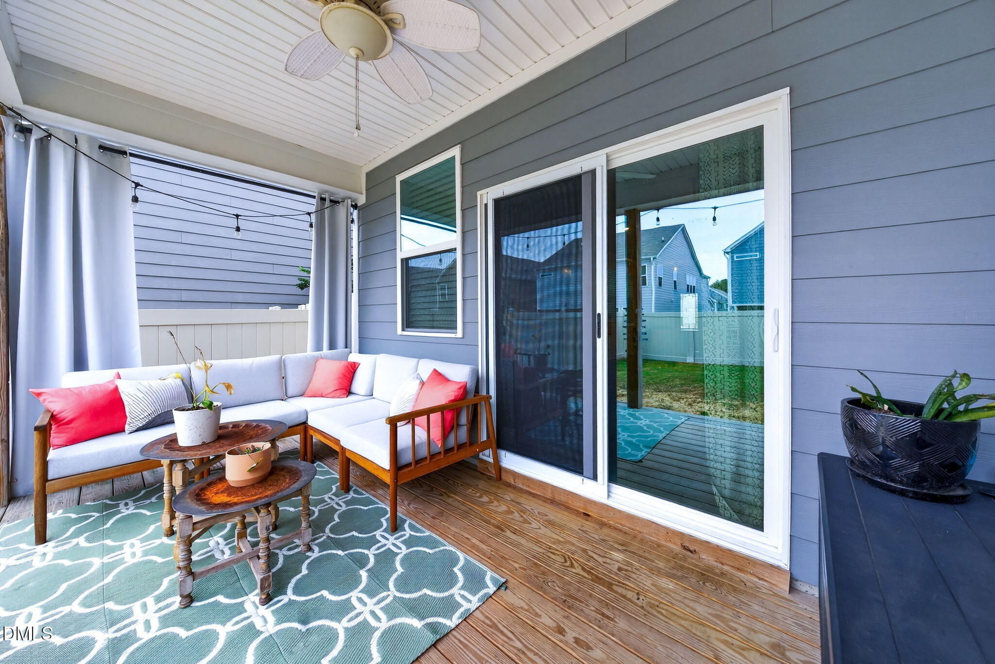 2928 Murray Rdg Trail Apex, NC 27502 - Photo 30 of 35 a outdoor space with patio the couch and glass door