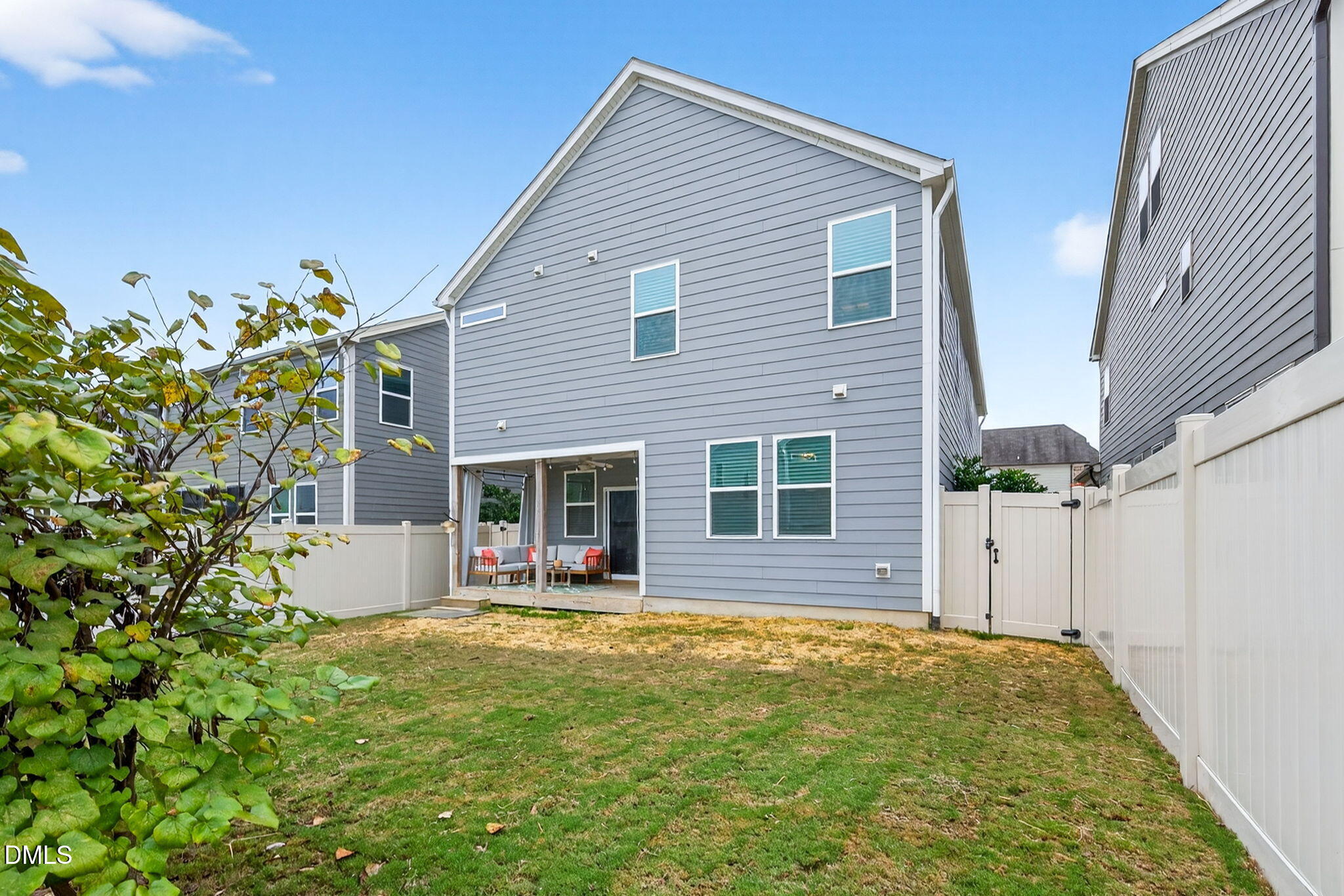 2928 Murray Rdg Trail Apex, NC 27502 - Photo 33 of 35 a backyard of a house with yard and outdoor seating